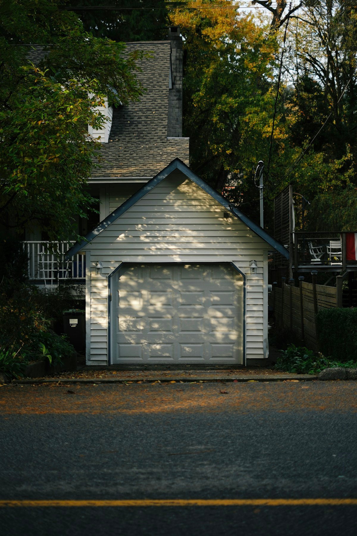 White raised-panel residential garage door